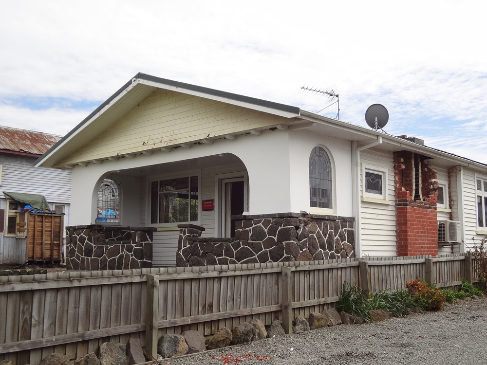 A picture containing building, outdoor, sky, houseDescription automatically generated